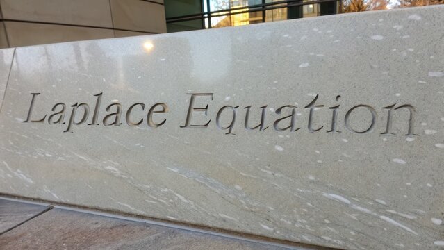 Engraved Stone Sign Displaying Mathematical Term Laplace Equation
