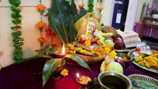 artistic lord ganesha murti with holy offerings at festive occasion