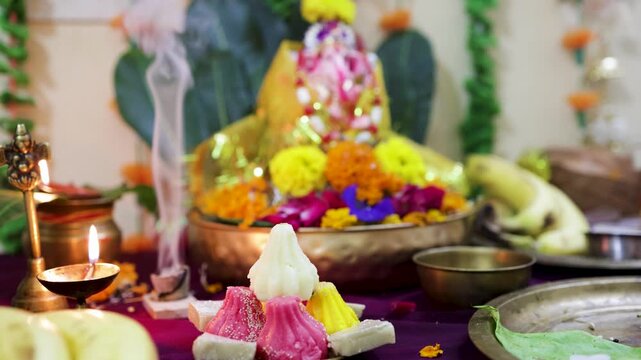 close up of colorful modak sweets during hindu religious celebration