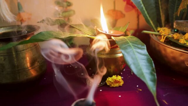 holy kalash with oil lamp and incense smoke on special festive occasion