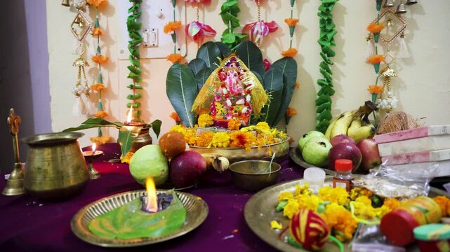 ganpti puja with holy aarti and offerings at home temple