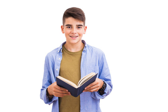 smiling teen boy holding an open book, looking at the camera, wearing a blue shirt and braces