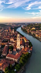 Obraz premium Aerial view of a city with a river and church