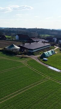 Aerial view of agricultural farm in rural countryside landscape