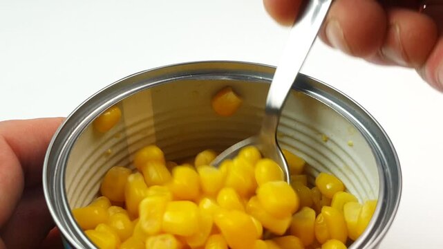 Close-up of canned corn in a jar. Corn, long-life vegetables.