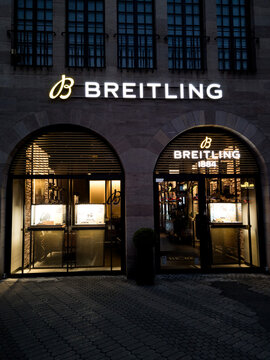 Breitling watch store facade with illuminated sign