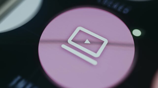 Computer screen with a play button icon representing Interactive video functionality