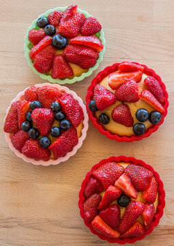 Small homemade berry tarts, cake with berries, close-up
