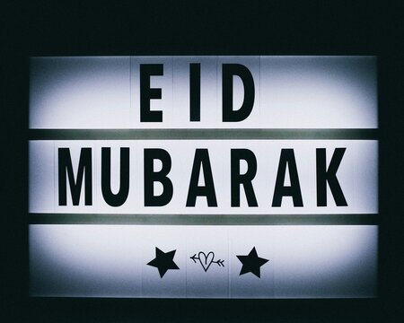 Eid Mubarak, Islamic greeting, festive message, holiday text, celebration sign