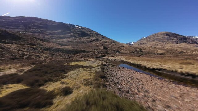 High-speed cinematic FPV drone footage captured in Glencoe, one of Scotland&rsquo;s most iconic mountain landscapes. Dynamic low-level drone flight along the River Coe.