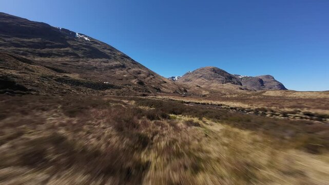 High-speed cinematic FPV drone footage captured in Glencoe, one of Scotland&rsquo;s most iconic mountain landscapes. Dynamic low-level drone flight along the River Coe.