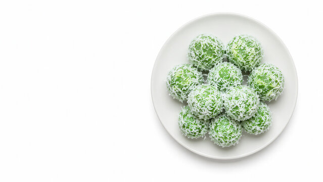Klepon indonesiano al cocco su piatto bianco. Generative AI 