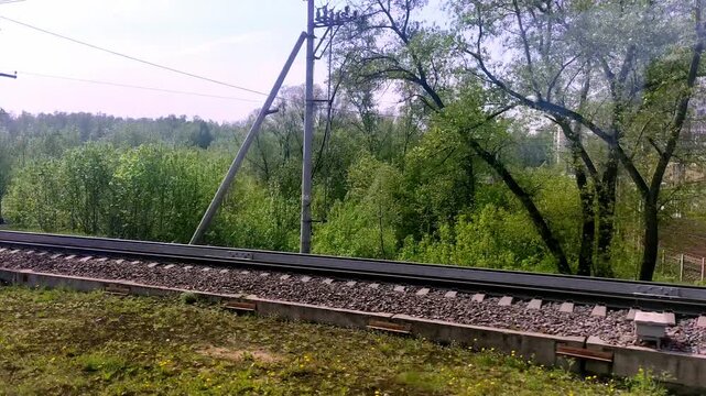A high-speed train arrives at the Rostokino station platform.