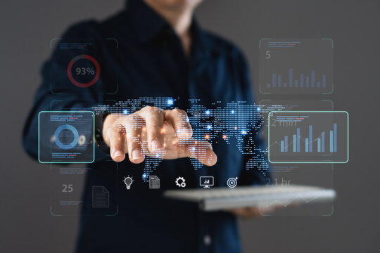 Businessman using global analytics dashboard with digital data visualization and business monitoring interface