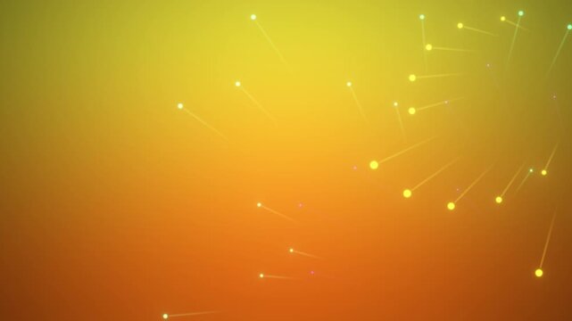 Abstract glowing particle fireworks bursting on a warm yellow and orange gradient background
