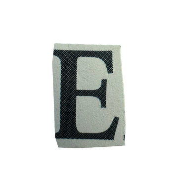 Ransom note style alphabet letter E hand-cut from vintage newspapers and magazines. Real paper collage character with authentic printed texture and handmade clipping isolated on transparent background