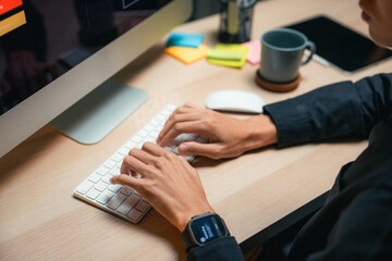Fototapeta premium Hardworking man freelancer takes a mindful stretch break after a long focus session, embracing digital wellness, work-life balance, and sustainable productivity in the remote work era