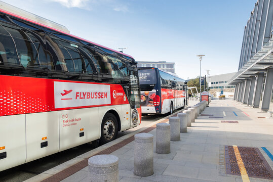 Stavanger Norway, May 3, 2026, Modern Boreal Flybussen electric airport shuttle buses parked at a terminal station, featuring zero-emission transport on a sunny day