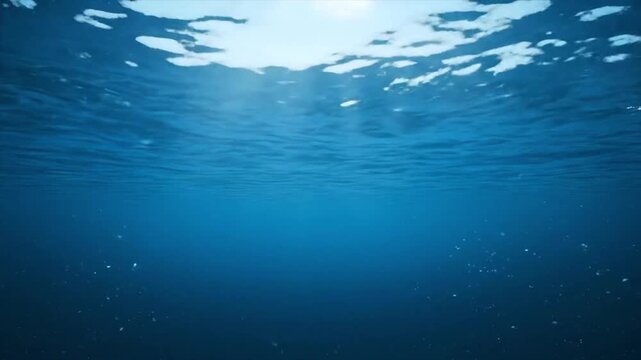 Underwater ocean waves with sunlight rays