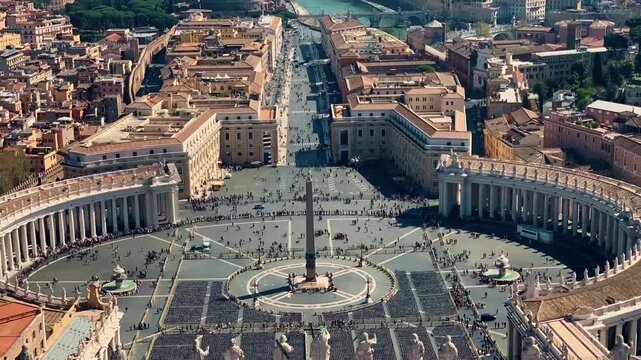 Aerial view of people walking and gathering in st peters square vatican city Rome Italy.