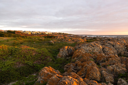 sunset light over DeKelders coastline, Gansbaai, South Africa