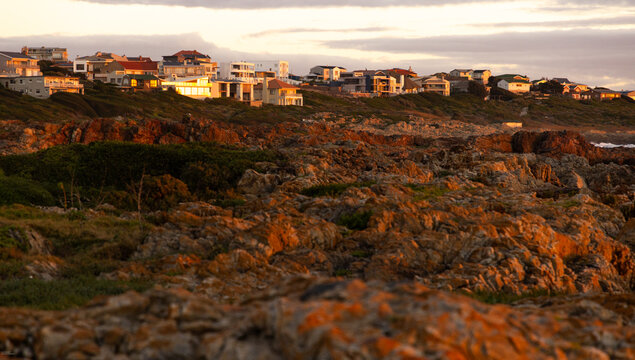 sunset light over DeKelders coastline, Gansbaai, South Africa