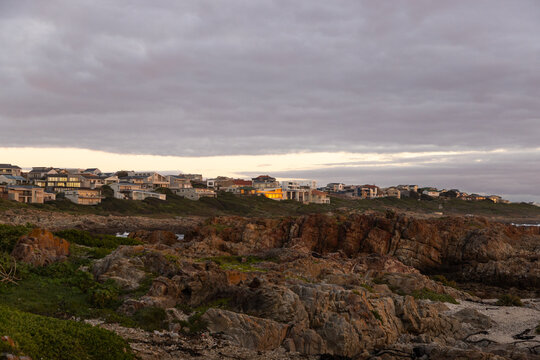 sunset light over DeKelders coastline, Gansbaai, South Africa