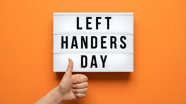 left handers day thumb up celebration