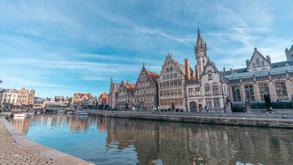 Fototapeta premium Historic canal cityscape in Ghent Belgium on a sunny day