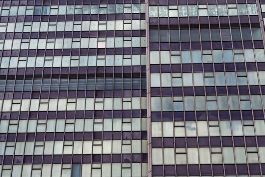 Abstract concept architectural detail of a corporate office building in the financial district of the British capital, London, centre of European investment and banking Industry.