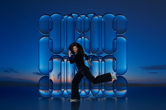 3D blue glass grid with woman in reflective studio