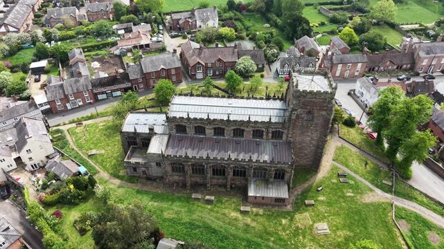 The stunning St Oswald&rsquo;s Church and surrounding Malpas - drone concentric flight, up to and over, Cheshire, UK