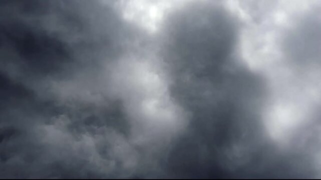 Dark storm clouds with lightning seamless loop