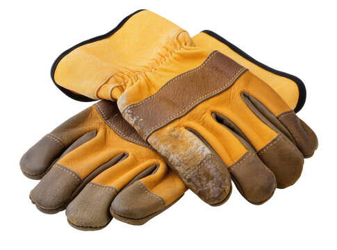Isolated pair of well-worn leather work gloves for construction and industrial protection