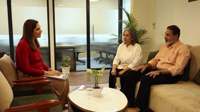 Indian Senior Businesspeople Interviewing young Female Job Candidate In Meeting Room. Recruitment Process, Opportunity of New hiring for company.