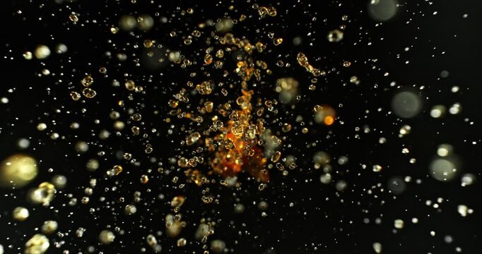 Super slow motion 1000fps video of an oil or gasoline splash isolated on a black background, ideal as a realistic VFX overlay effect for cinematic compositing and visual effects.