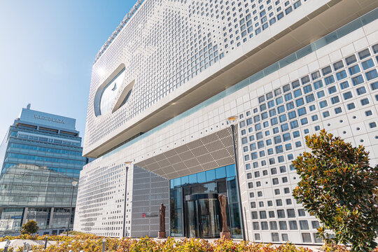 25 October 2025, Belgrade, Serbia: Chinese Cultural Center building featuring contemporary perforated facade and unique window shapes