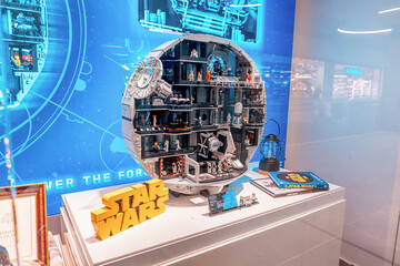 Fototapeta premium 19 October 2025, Belgrade, Serbia: Detailed LEGO Star Wars Death Star toy model showing multiple interior scenes with minifigures on an exhibition stand