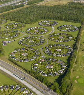 Aerial view of the unique circular garden communities of Brondby Haveby with lush green lawns and houses arranged in circles Brondby, Denmark.