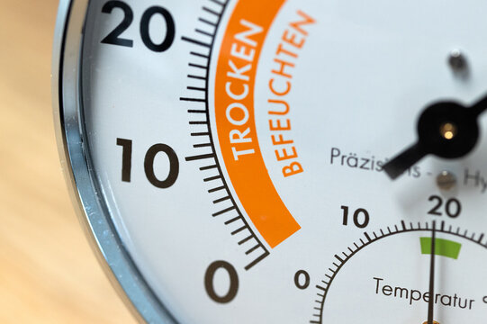 Hygrometer for displaying indoor humidity. Technical measuring device, optimal room temperature, air too dry or too humid.