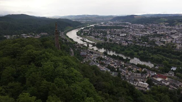 Aerial view of trier cityscape overlooking the moselle river and mariensaule monument