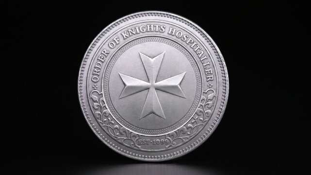 Silver coin with a cross and a Masonic symbol. Order of knights hospitaller EST 1099. Order of the ninety nine plus AME