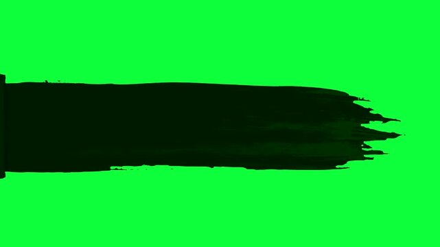 An animated black paint brush stroke appears dynamically across the center of the scene. The clip is set against a chroma key green screen for simple compositing and overlay masking.