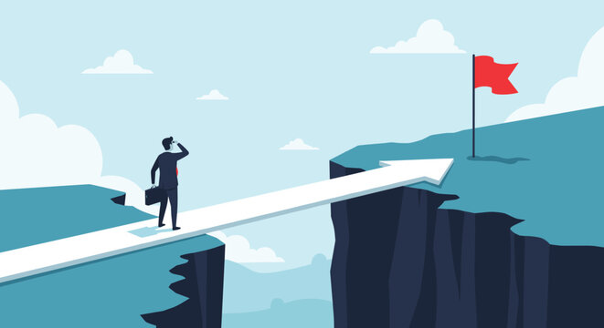 Ambitious professional walking across an arrow bridge spanning a deep chasm to reach his target goal marked by a red flag.