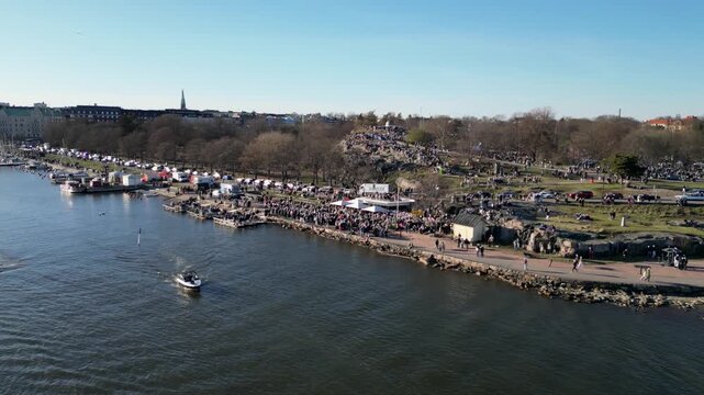 Large Crowd Gathering at Kaivopuisto During Vappu Festival