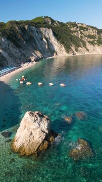 Spiaggia di Sansone Beach, Elba Island Italy &ndash; Flying Drone Reveal Over Rock Formation and Turquoise Sea