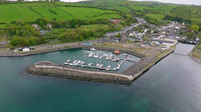 Wide rotating 4K 60FPS aerial video of Glenarm in County Antrim, Northern Ireland in the UK. Produced in 3840x2160 and with Rec709 color.