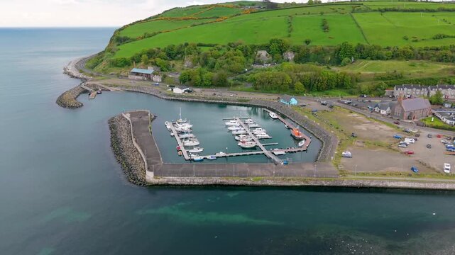 Rotating 4K 60FPS aerial video of Glenarm in County Antrim, Northern Ireland in the UK. Produced in 3840x2160 and with Rec709 color.