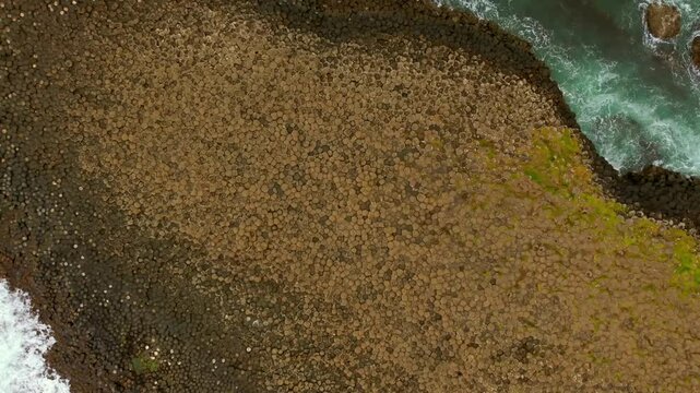 Rising 60FPS 4K aerial of The Giant's Causeway in Bushmills, County Antrim in Northern Ireland. Produced with Rec709 color in 3840x2160.