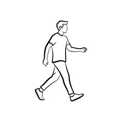 Fototapeta premium Young man walking casually in a relaxed pose, wearing a t-shirt and jeans, feeling carefree